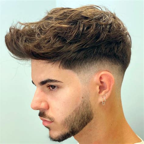 20 cortes de pelo degradado para hombre que son。